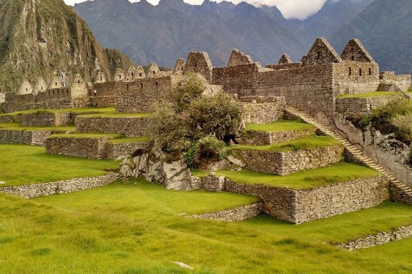 Machu Picchu ruins surrounded by mountains